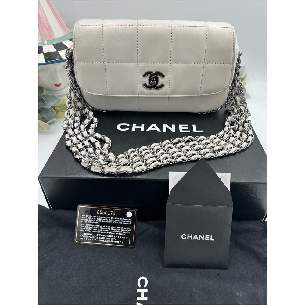 Women's vintage Chanel multi chain quilted flap bag made in Italy PRISTINE